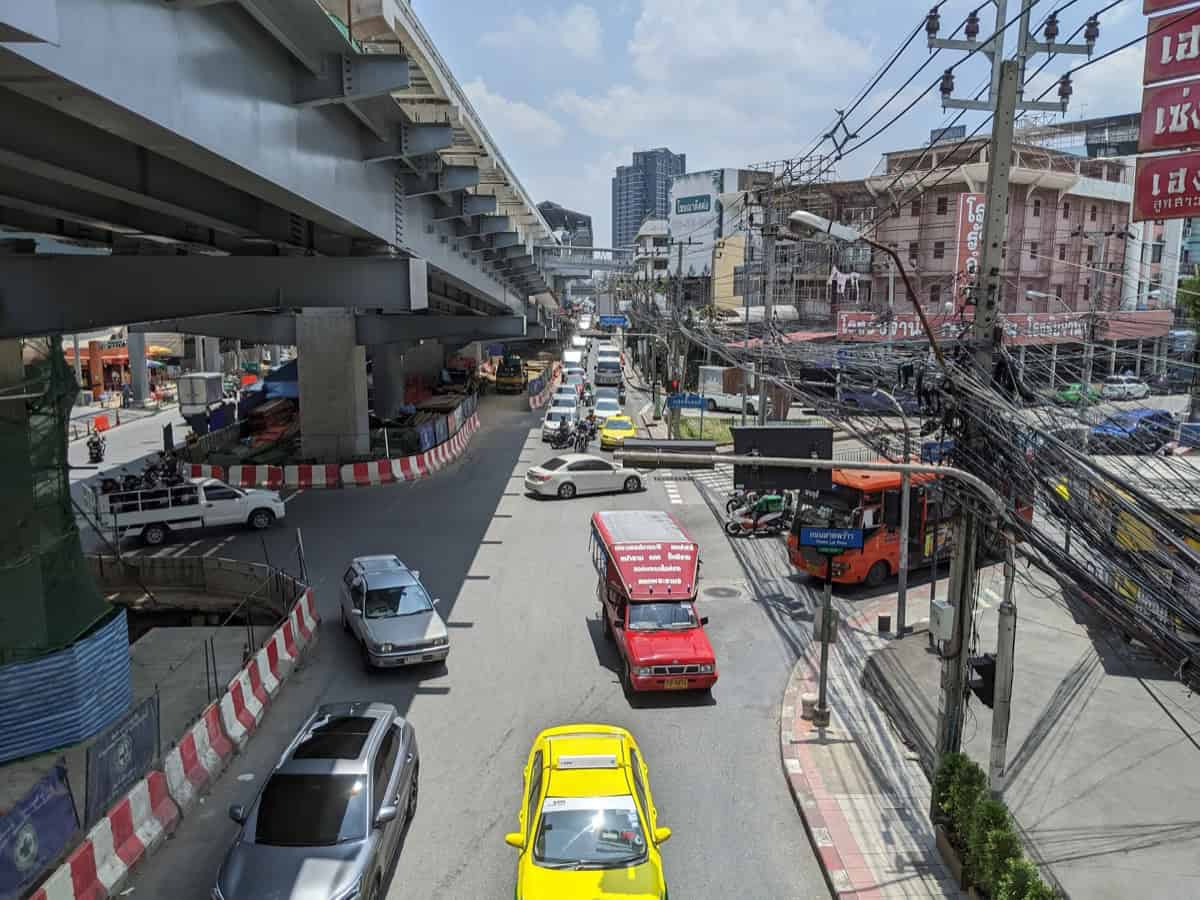 Ladprao Road Bangkok with elevated MRT line above heavy traffic